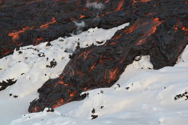 photo of Watching lava fight with snow in Kamchatka image
