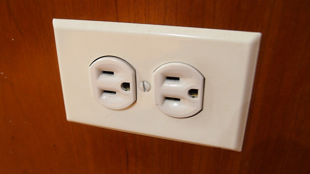 This outlet in the kitchen, where we often plug devices in to charge, is the perfect candidate for an upgrade.