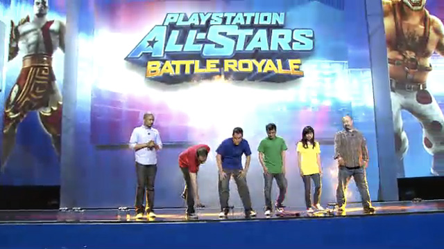 Sony reps showing the cross-compatibility for <em>AllStars</em> between the Vita and PS3.