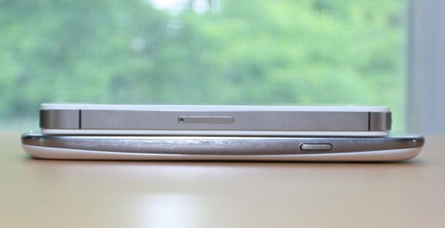 An iPhone 4S on top of a Galaxy S III