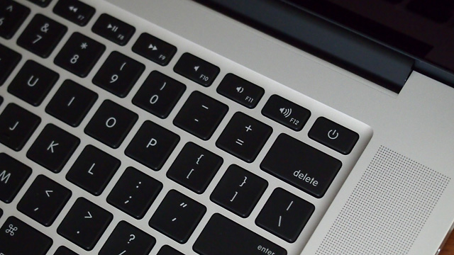 The backlit keyboard is more Air-like, including the revised power button.