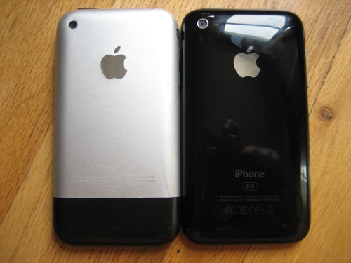 An original iPhone next to an iPhone 3G