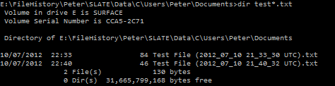 Two versions of a file named Test File.txt showing how the filename gets modified to incorporate timestamps