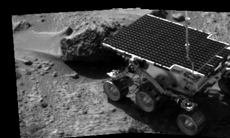 The Sojourner rover meets a rock on Mars. The image was taken by the Carl Sagan Memorial Station, the immobile part of the Mars Pathfinder mission.
