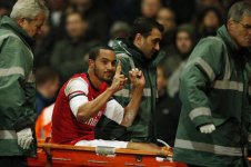 Theo Walcott reminding the Spuds fans of the score