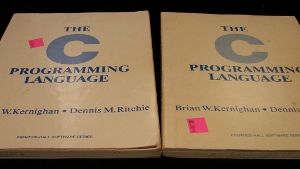 Copies of <em>The C Programming Language</em> in their native campus bookstore environment, written by Brian Kernighan and Dennis Ritchie (RIP).