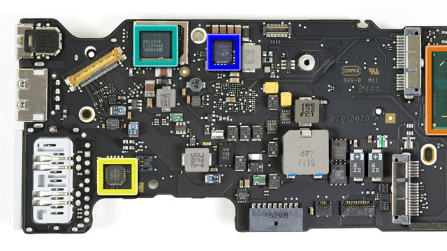 The Eagle Ridge SFF Thunderbolt controller, outlined in green, the left side of the 2011 MacBook Air logic board.
