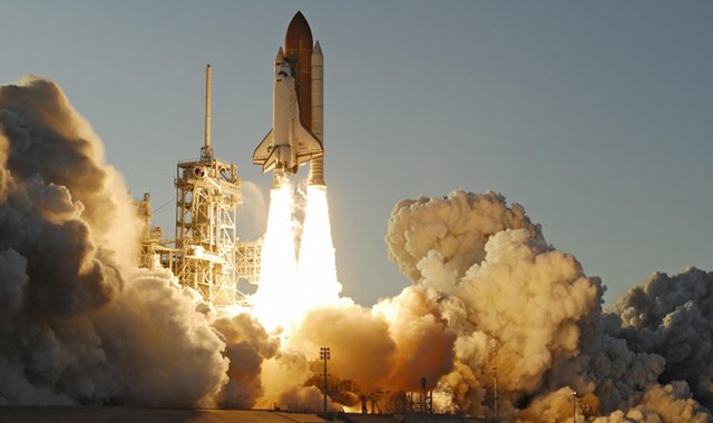 Space shuttle Atlantis during liftoff