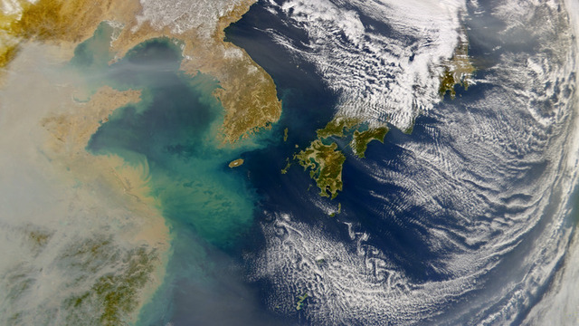 Pollution spreading over the ocean from China.