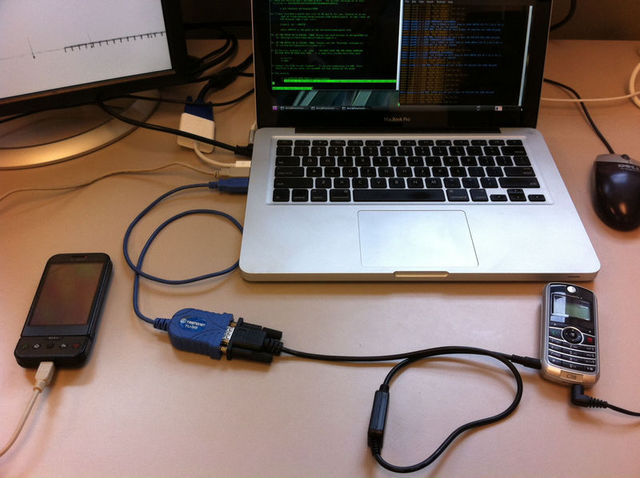 A T-Mobile G1, a Motorola C118 with modified firmware connected a laptop running open-source software and a landline (not pictured) was all scientists needed to tease out key details about a target's location on GSM networks.