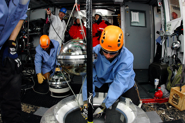 Staff in Antarctica get ready to lower parts of the Ice Cube detector into the ice sheet.