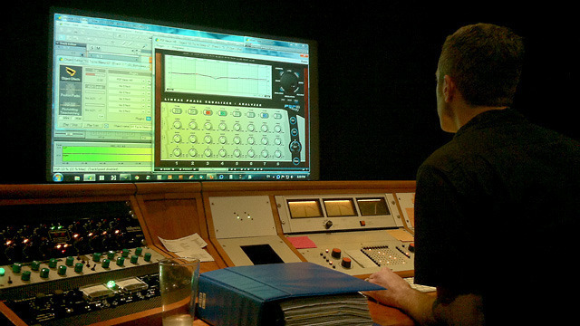 Chicago Mastering Service engineer Jason Ward loads up songs to compare in the mastering room.