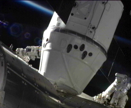 SpaceX Dragon berths with International Space Station