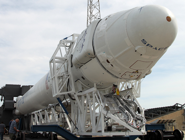 The Dragon/Falcon 9 combination on their way to the launch pad.