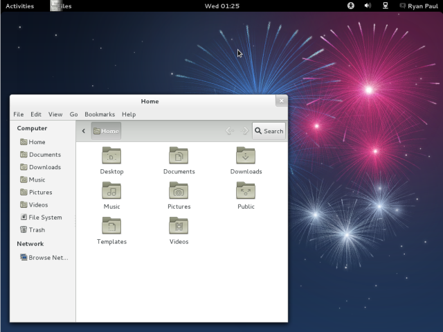 Fedora 17's GNOME 3.4 desktop. The default wallpaper needs more cow.