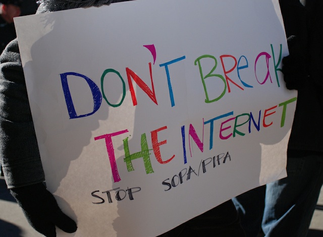 A protester asks for an intact Internet.