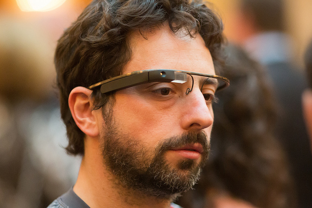 Google cofounder Sergey Brin wears a prototype pair of Google Glasses