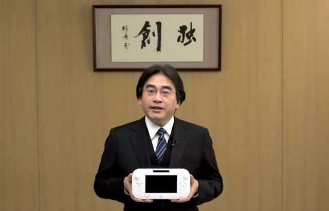 Nintendo President Satoru Iwata speaks as he unveils a Nintendo