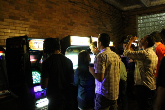 People getting their game and drink on during opening night at Emporium Arcade and Bar.