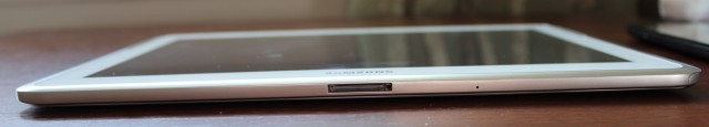 On the bottom of the tablet, you'll see its proprietary power and data connector. On the right side, you can also see the compartment where the pen is stored.