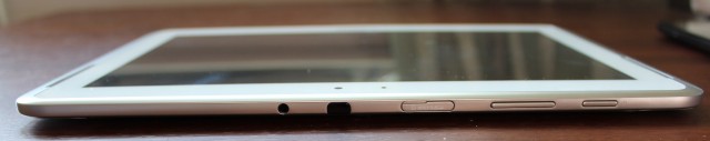 Across the top of the Note 10.1: the headphone jack, IR blaster, SD card slot, volume rocker, and power button.