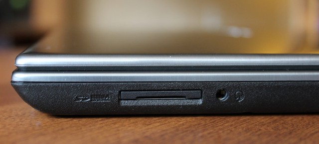 The SD card slot and headphone jack are the only thing on the right side of the laptop.