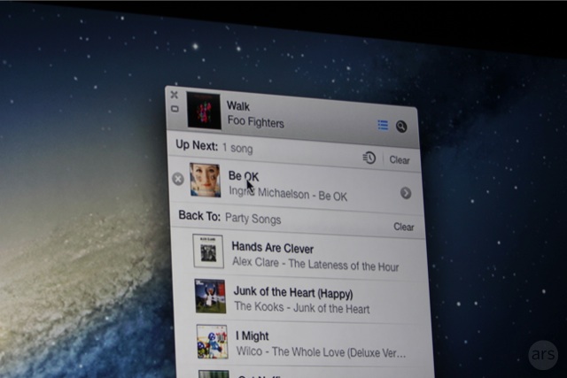 An expanded iTunes mini player.