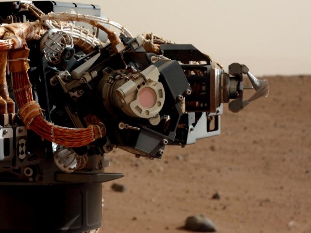 The MAHLI imager, photographed by Curiosity's mast cam.