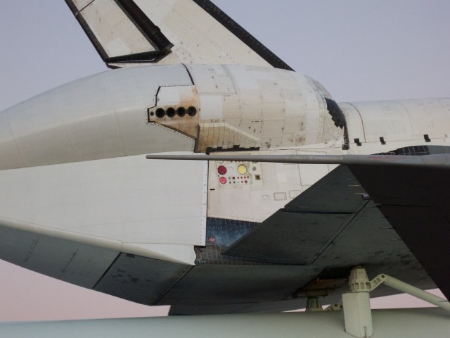 Detail of Endeavour's umbilical ports. These are connected to the Tail Servicing Mast prior to launch and are used to load propellent and provide ground power to the vehicle.