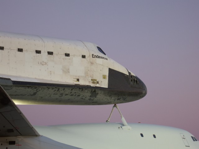 Closer view of Endeavour's forward section, showing the flight deck and cargo bay door details.