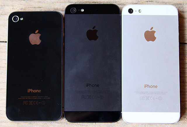 Left to right: Black iPhone 4S, black iPhone 5, white iPhone 5. 