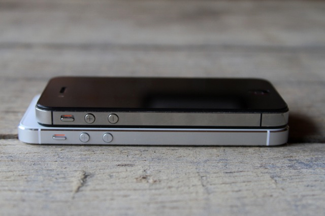 An iPhone 4S stacked on top of an iPhone 5.