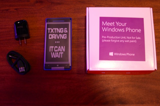 The HTC Windows Phone 8X alongside its box. Don't text and drive.