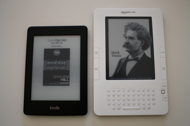 The Kindle Paperwhite and a second-generation Kindle, side by side.
