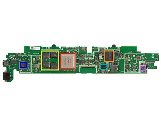 The Surface RT's motherboard. Tegra 3 SOC in red, Samsung RAM in yellow, Marvell MIMO SOC in blue at left.