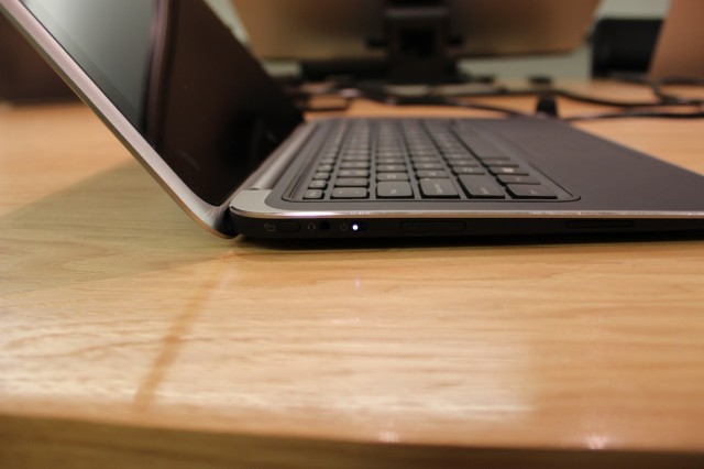 On the left side of the laptop, a screen rotation button and volume rocker for when it is in tablet mode, as well as a power button/LED and a headphone jack.