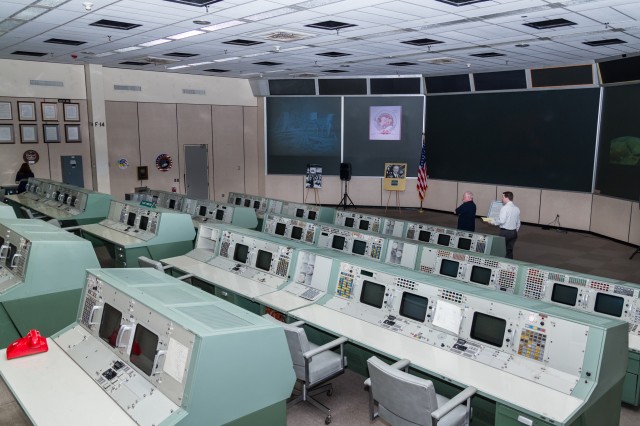 MOCR 2, from the top row next to the DoD console, looking across at the left front rear projection screens.
