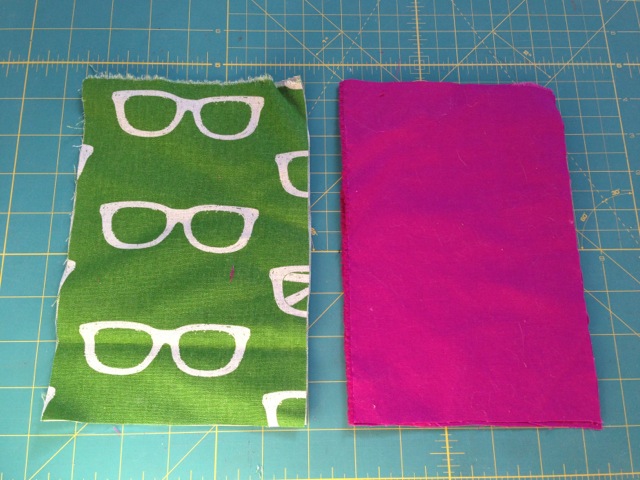 The fabric I've cut for my Kindle Fire sleeve. Left is the outer fabric and right is the lining.