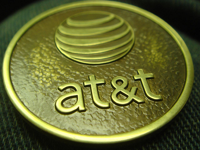 AT&T is glad to expand service, but wants pesky FCC regulations dropped