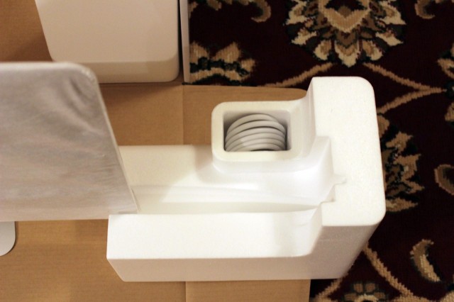 The power cable is stored in a sealed styrofoam compartment.