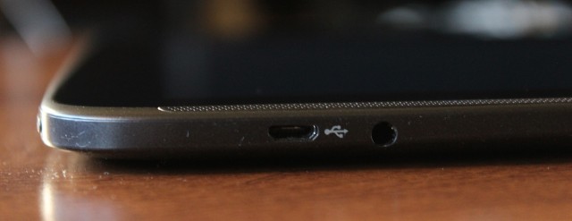 The Micro USB and headphone jack. The Galaxy Note 10.1 used a proprietary connector for charging, so the inclusion of a standard plug is a nice change.