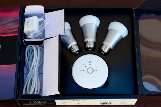 This is what's in the box: three Hue bulbs, a bridge, an AC adapter, and a length of cat 5 cable.