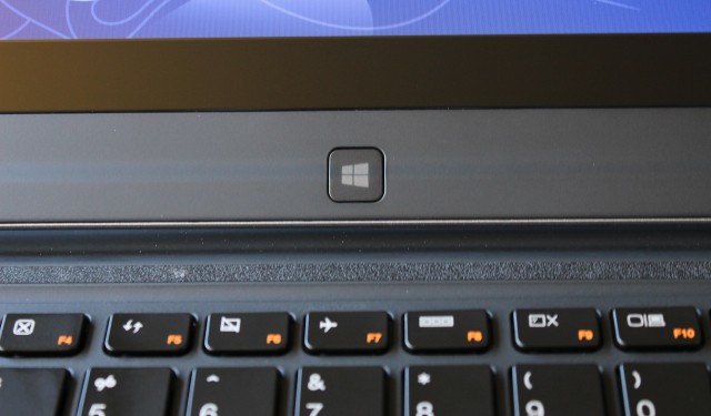 A Windows button is located under the LCD panel, for use when the laptop is in tablet mode.