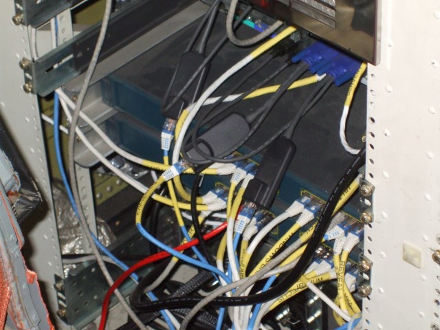 The DC-8's onboard network rack and "Housekeeping" systems—the sensors and computer hardware that are permanently installed in the flying laboratory.
