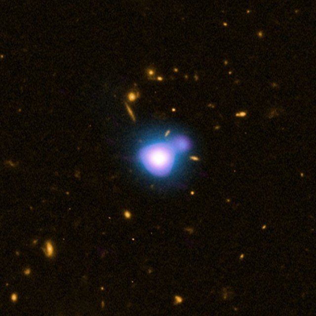 Composite X-ray/optical/radio image of a quasar: a bright supermassive black hole. Studies of a similar quasar found only neutral hydrogen in the environment, which may help constrain models of the environment in which the first stars formed.
