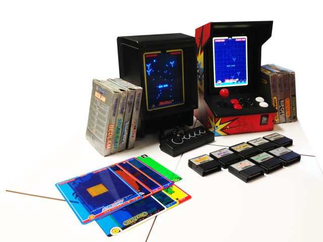 The original Vectrex (left) and the iOs recreation, seen with an iCade