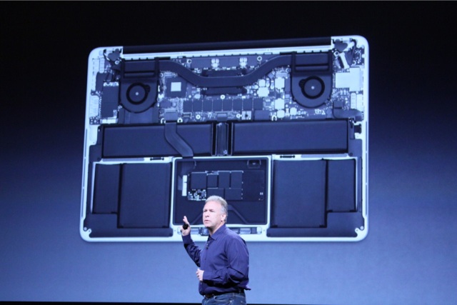 Apple's Phil Schiller showing off the internals of a retina MacBook Pro in San Jose on October 23, 2012.