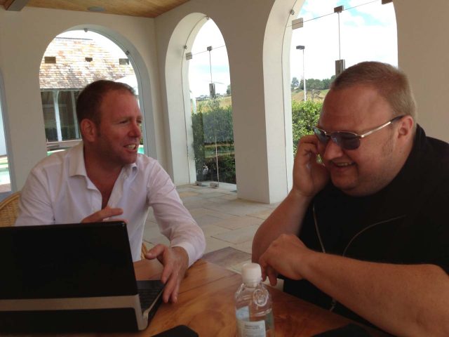 Kim Dotcom (right) shares a lighthearted moment with colleague Finn Batato.