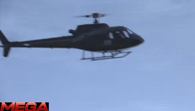 "FBI" Helicopter descends on Kim Dotcom's party.