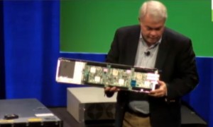 Dell's Chief Architect and Technologist Jimmy Pike shows an Iron board with six individual 64-bit ARM servers at the Open Compute Summit.